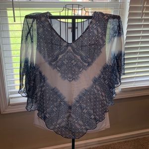 Cute flowing top would look great on anyone!